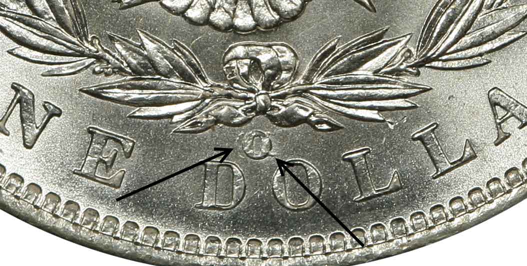 1900 Morgan silver dollar comparison: plain O mint mark vs O/CC overmintmark with CC remnants visible